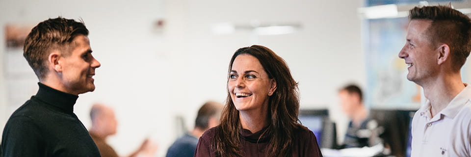 Pia in the office with colleagues